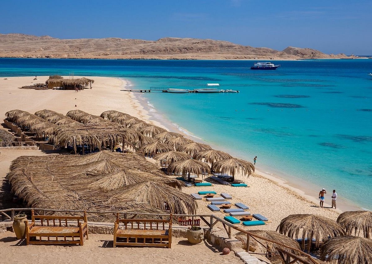Golden sands and clear blue water at Paradise Island near Hurghada